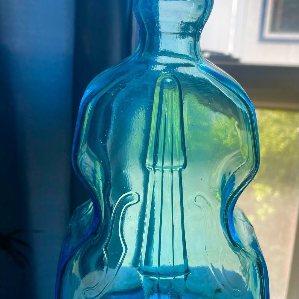 Vibrant Blue Glass Art with Translucent Elegance